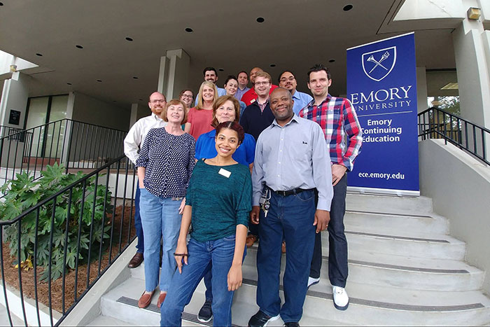 Emory Continuing Education staffers pose in their jeans on Denim Day.