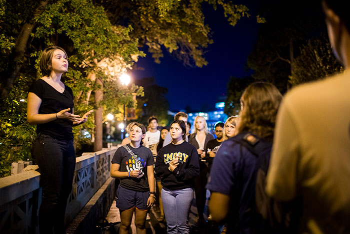 Several Emory students gather with candles at the Oct. 4 candlelight vigil.