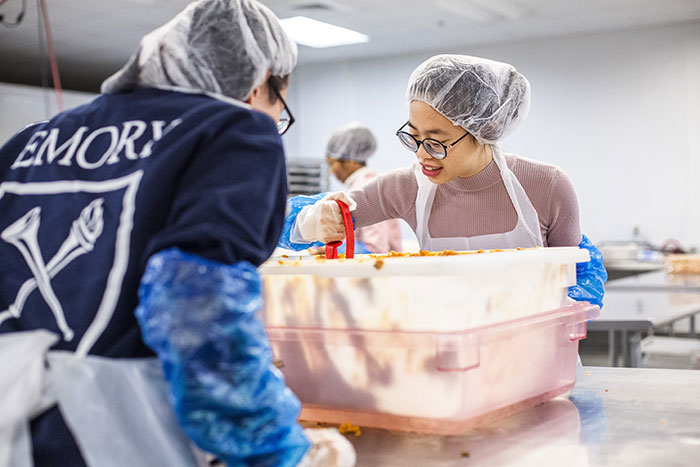 Students prepare meals at Project Open Hand