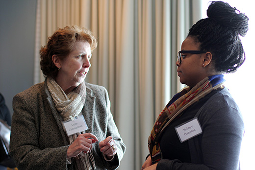 Student Bobbye Hampton converses with Lynn Zimmerman, senior vice provost of academic affairs.