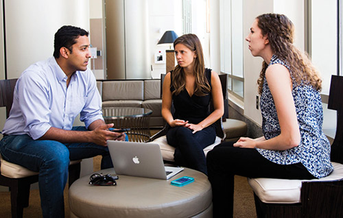 Nishant Kishore taught fellow students Kyndall White 17MPH, right, and Katherine Stanfill 16MPH, middle, how to build mHealth platforms through Rollins mHealth Collaboration.