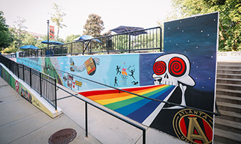 The Cox Hall mural features lots of Atlanta landmarks