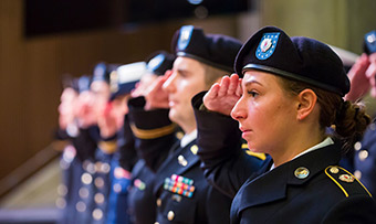 Emory active duty soldiers give a solute