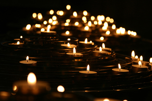 Lit vigil candles