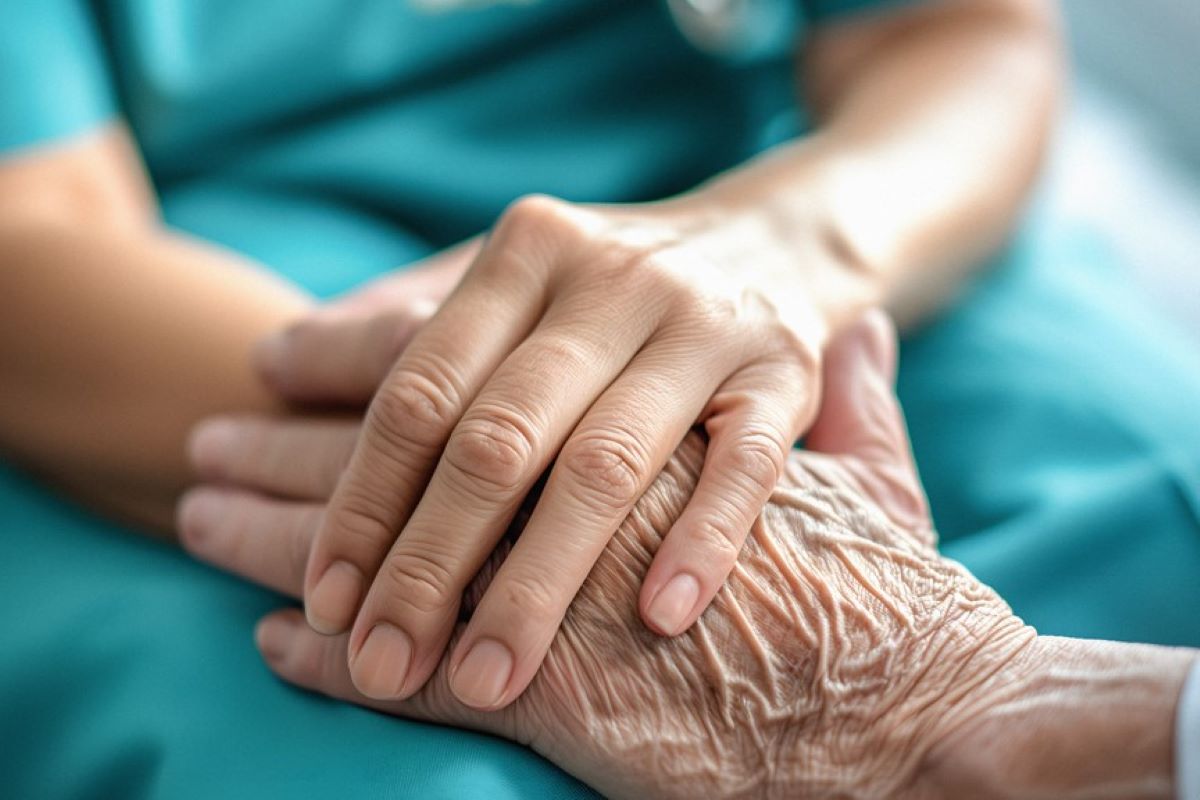 Physician talking with an elderly patient