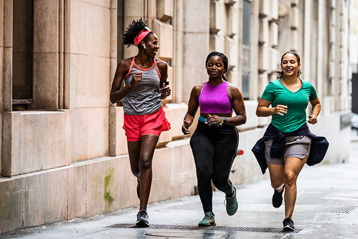 three people running