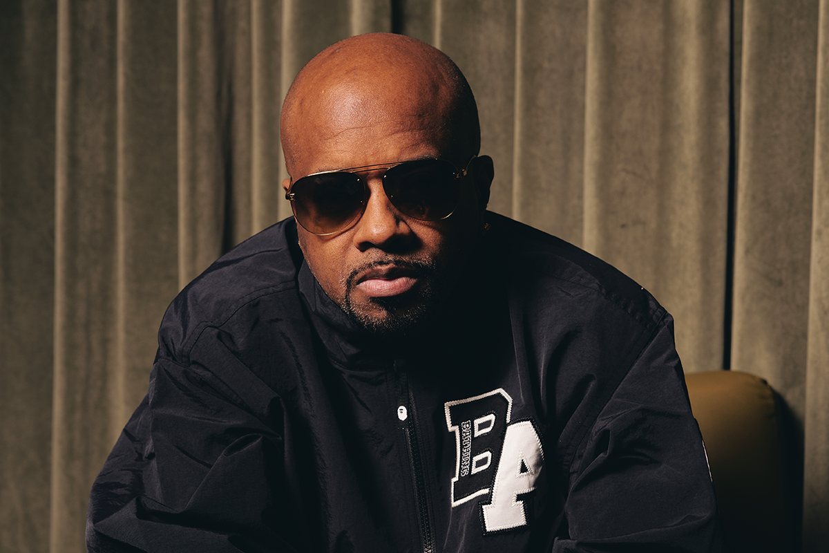 headshot of Jermaine Dupri wearing glasses