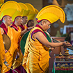 Image of Tibetan Monks in ceremonial robes