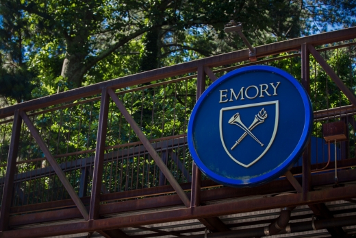 brown bridge with blue emory university logo