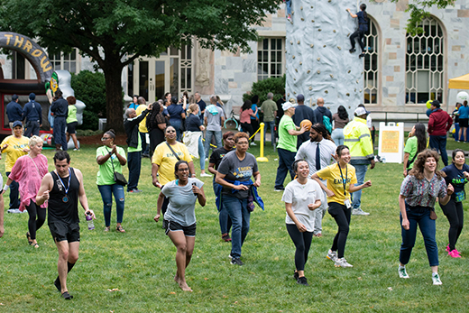 adults group dancing outside