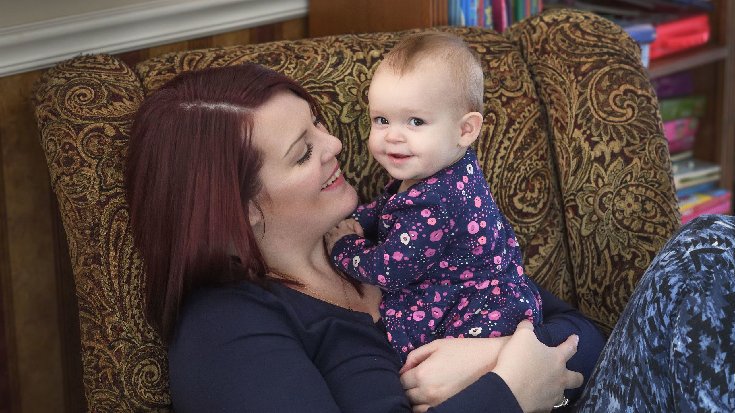 Megan Blay holds her infant daughter, Emma Blay.