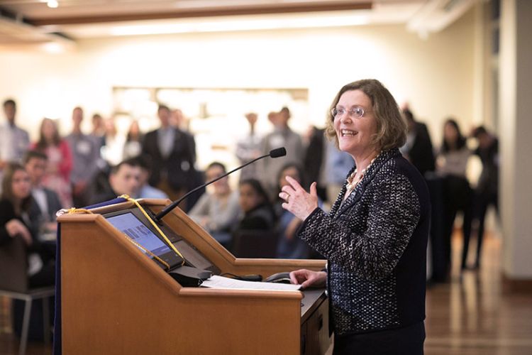 Emory President Claire E. Sterk speaks to finalists during Emory Scholars Weekend last spring