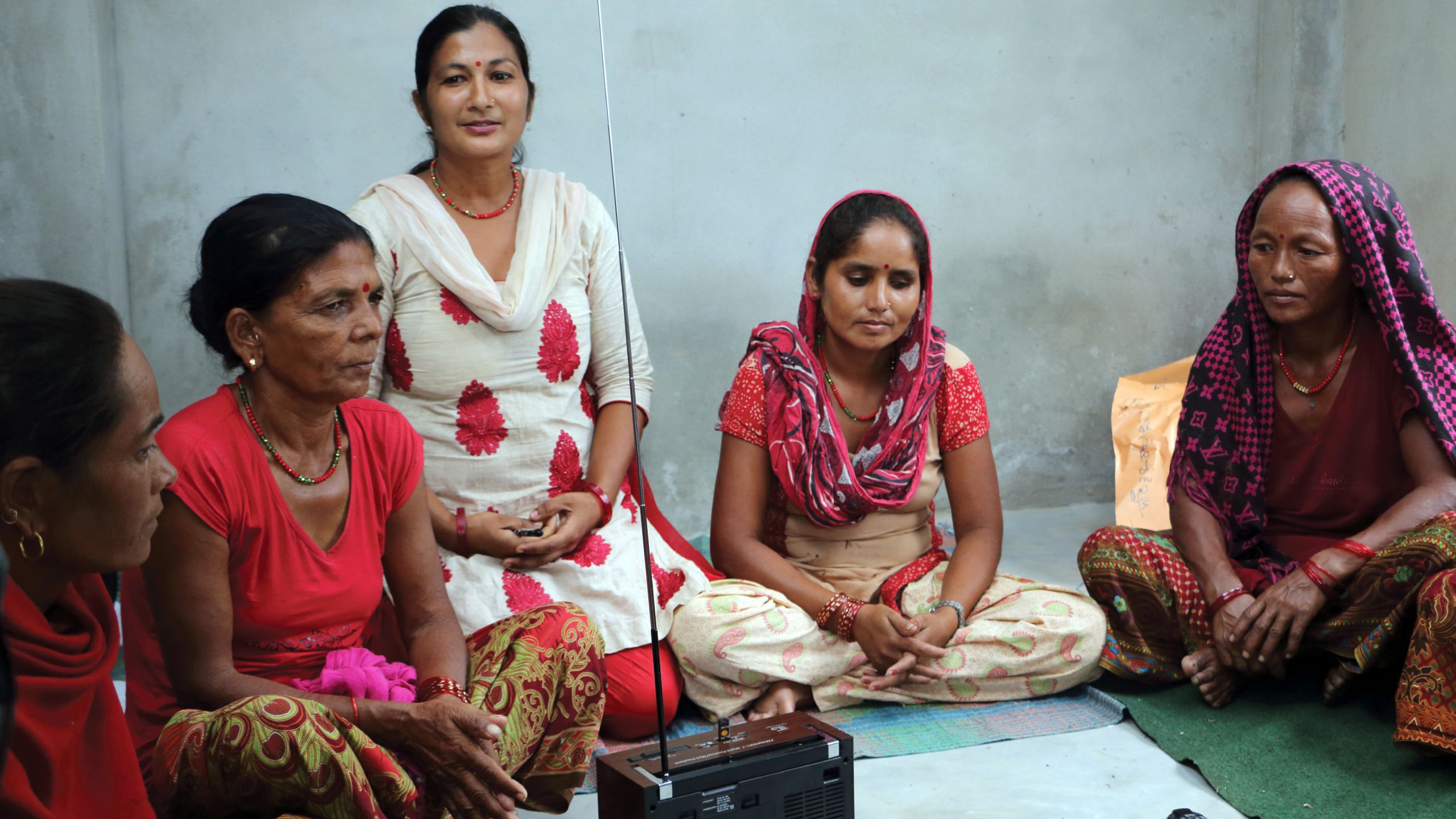 A radio drama is  part of an intervention to curb intimate partner violence  in Nepal. Cari Jo Clark , who is not pictured here, is working with Equal Access International to roll out the next phase.
