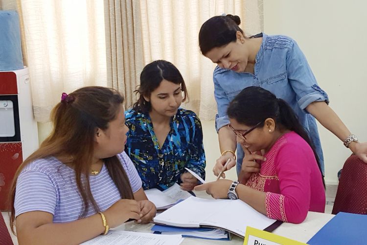 photo Members of the field team for the Room-to-Read evaluation project receive training. Room to Read is an international NGO that focuses on early literacy programs in primary schools and a life-skills based girls’ education program in secondary schools.