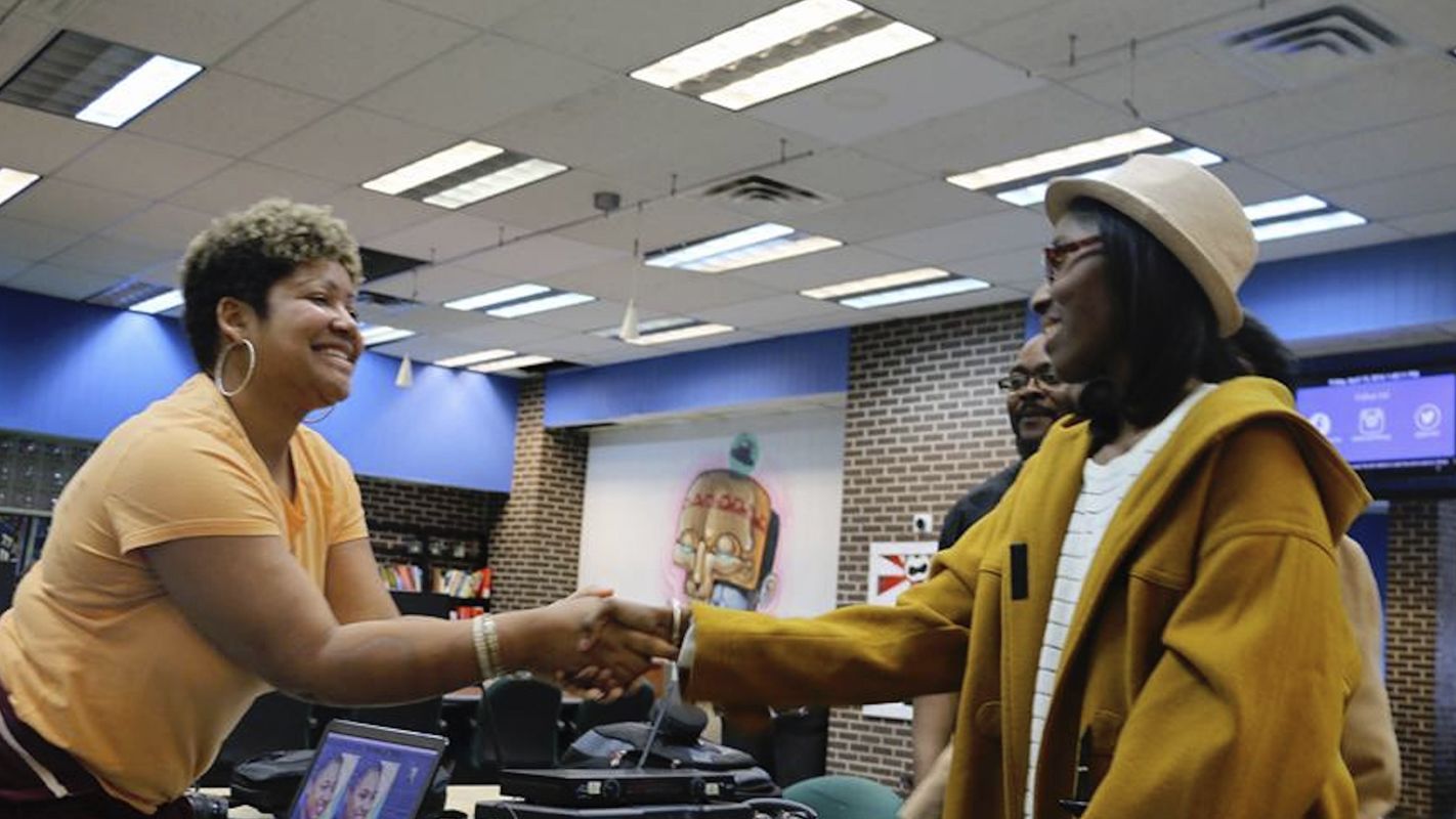 Hassanatu Blake with a community entrepreneur