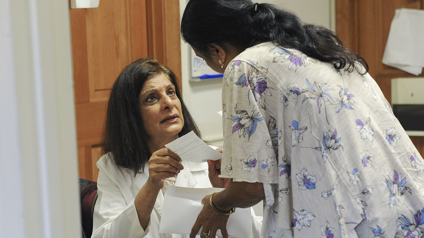 Gulshan Harjee with a patient