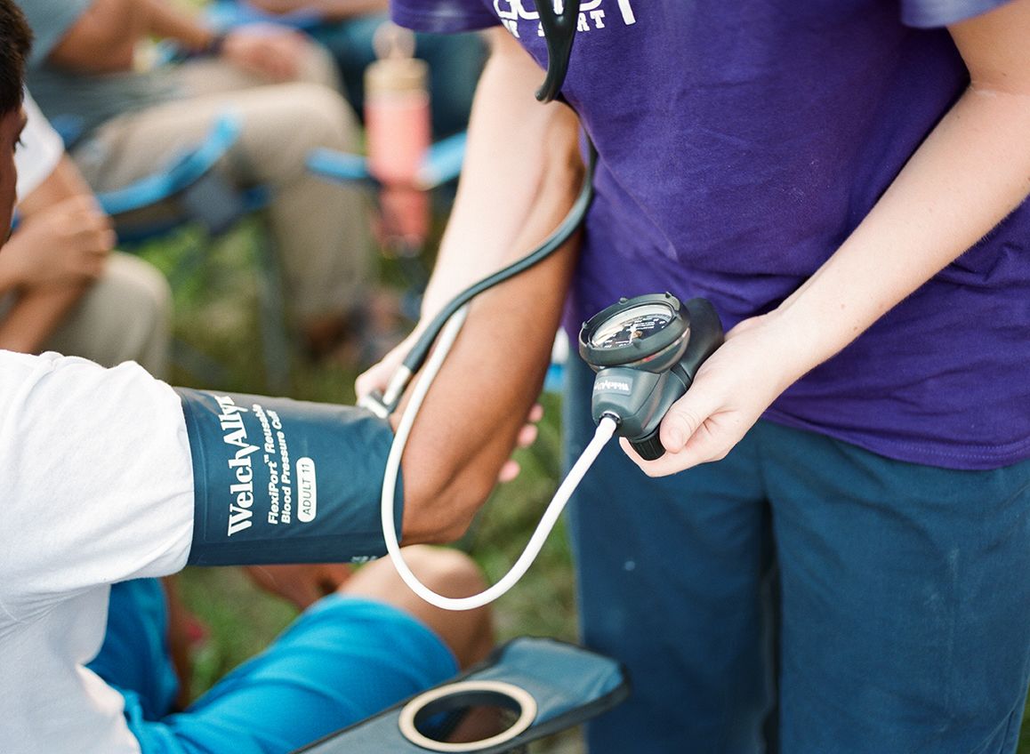 Emory students from the School of Medicine's Physicians Assistant (PA) Program volunteer in a field