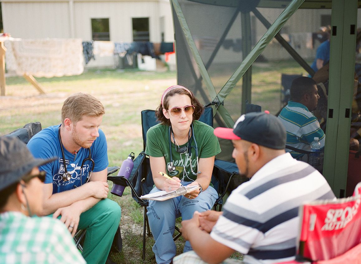 Emory students from the School of Medicine's Physicians Assistant (PA) Program volunteer in a field