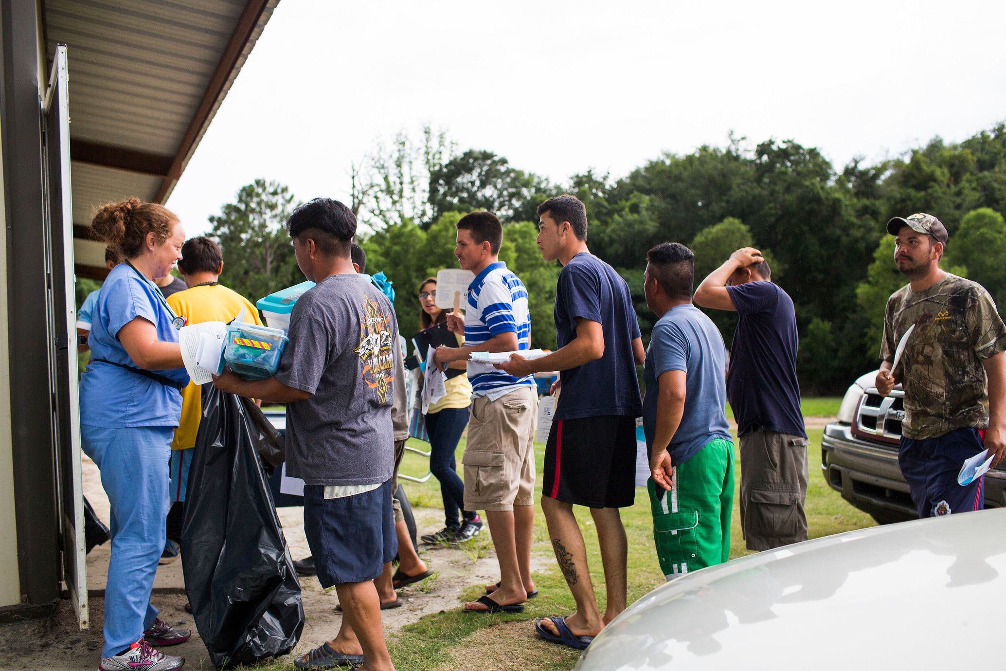 Emory students and faculty work at the night camp at Lewis Taylor Farms