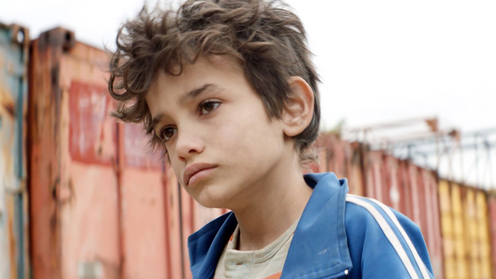 Close-up shot of 12-year-old actor Zain Al Rafeea in the film "Capernaum"