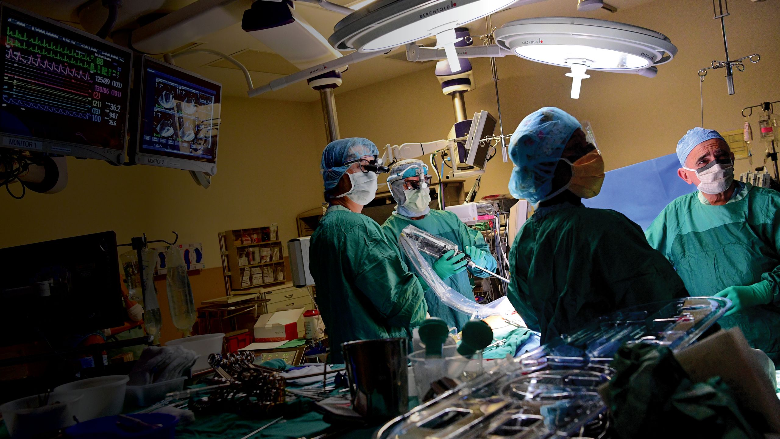 An image of Emory doctors in a surgical room performing surgery