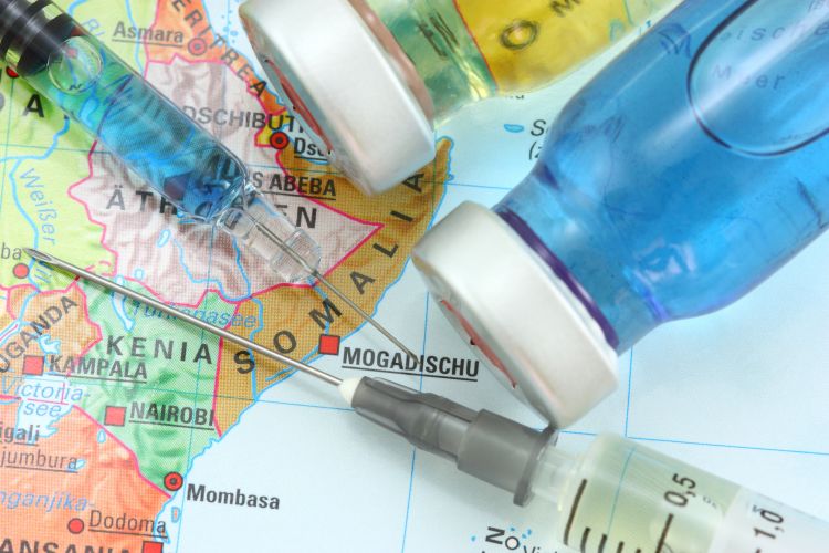 Map with vaccine syringe.
