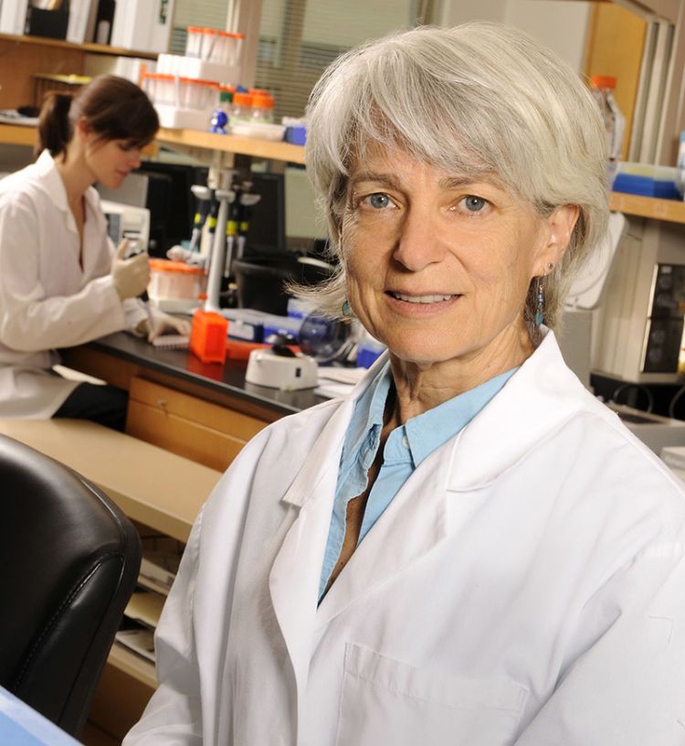 Emory geneticist Stephanie Sherman standing in her lab.
