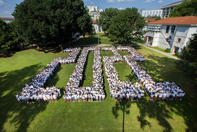 A photo of most members of the Class of 2022 grouped together to spell out "2022"