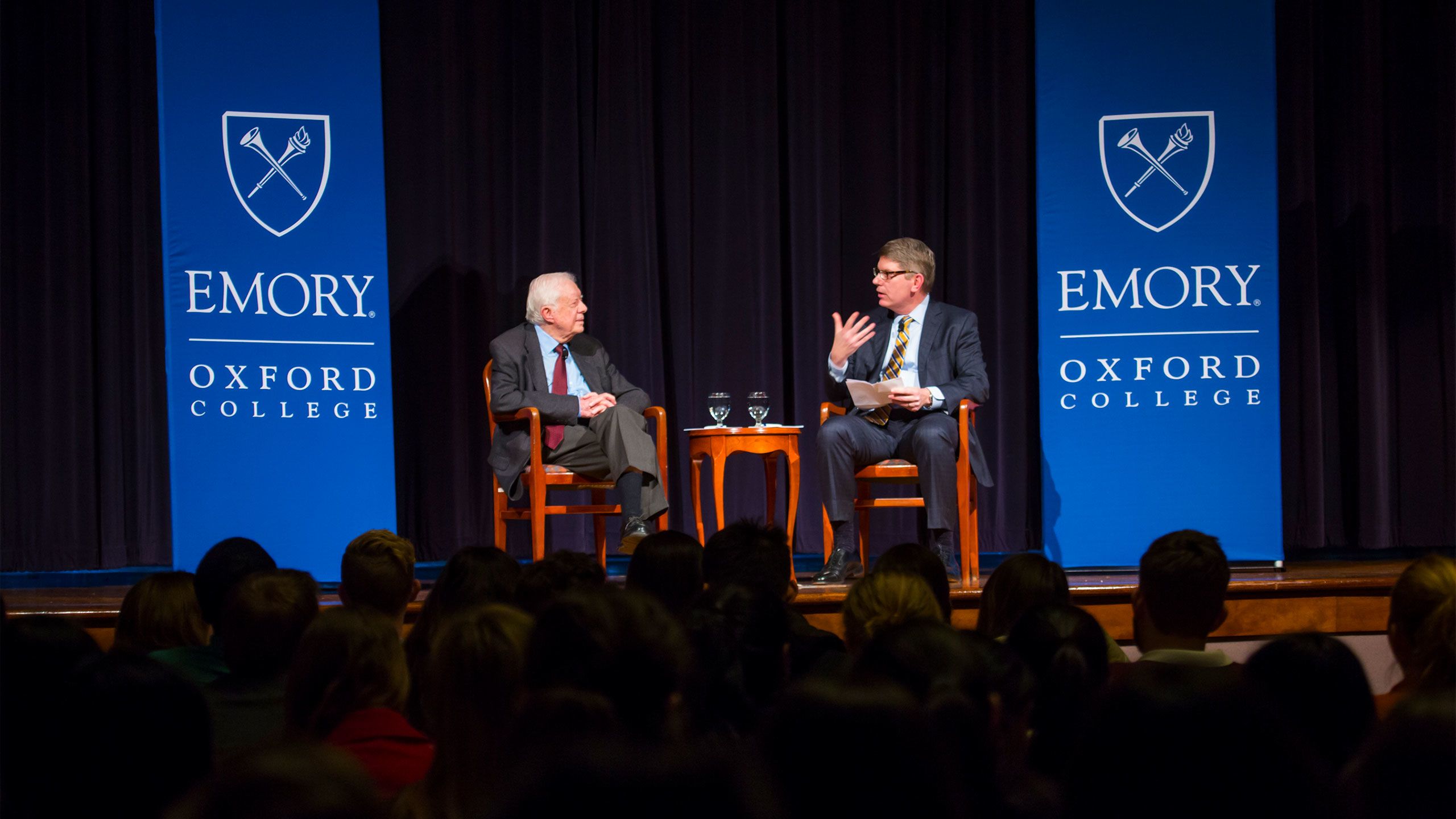 President Jimmy Carter discusses leadership with Oxford College Dean Douglas A. Hicks on a stage at Oxford College