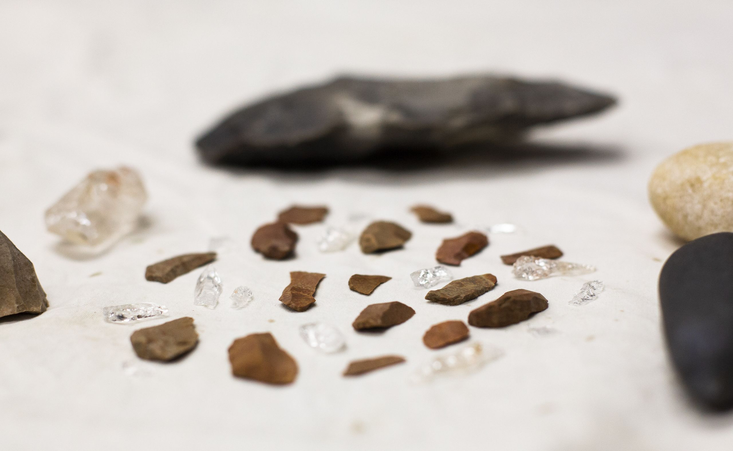 Close up of tiny stone flake tools.