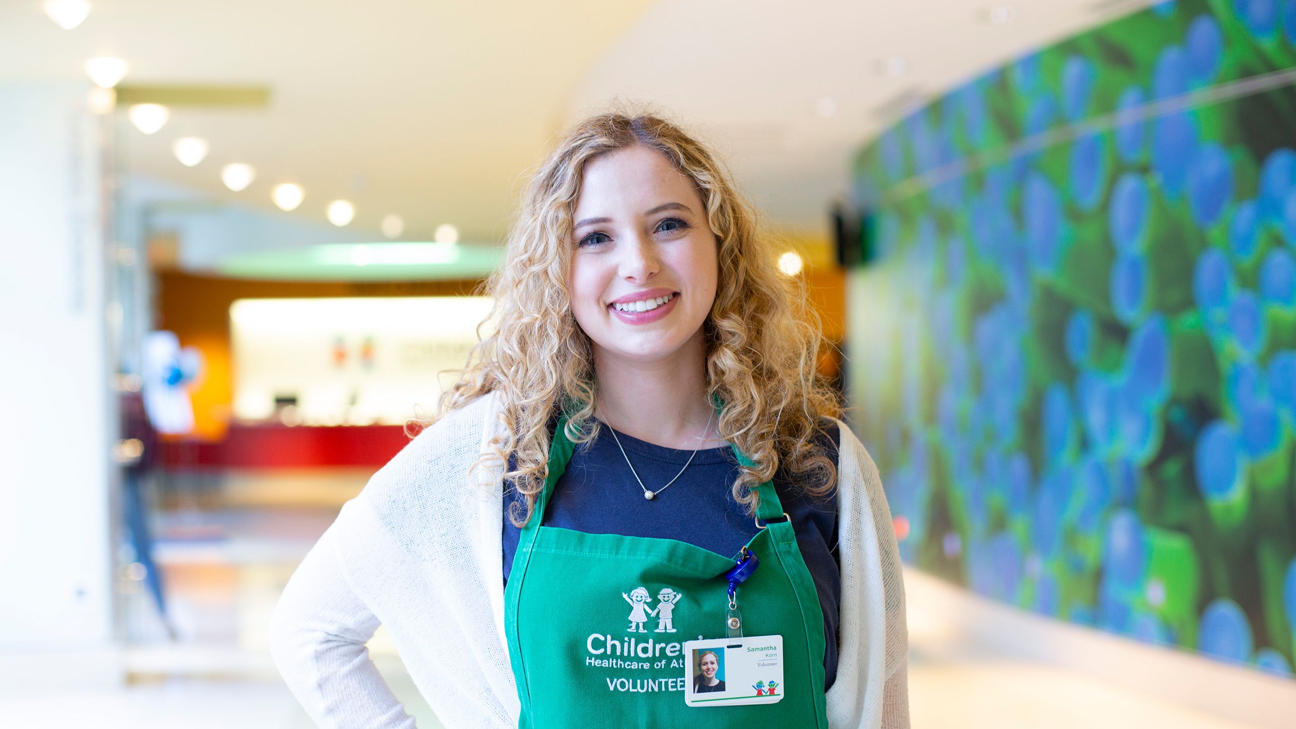 Samatha Korn Smiling and posing for the camera at Children's of Atlanta Hospital
