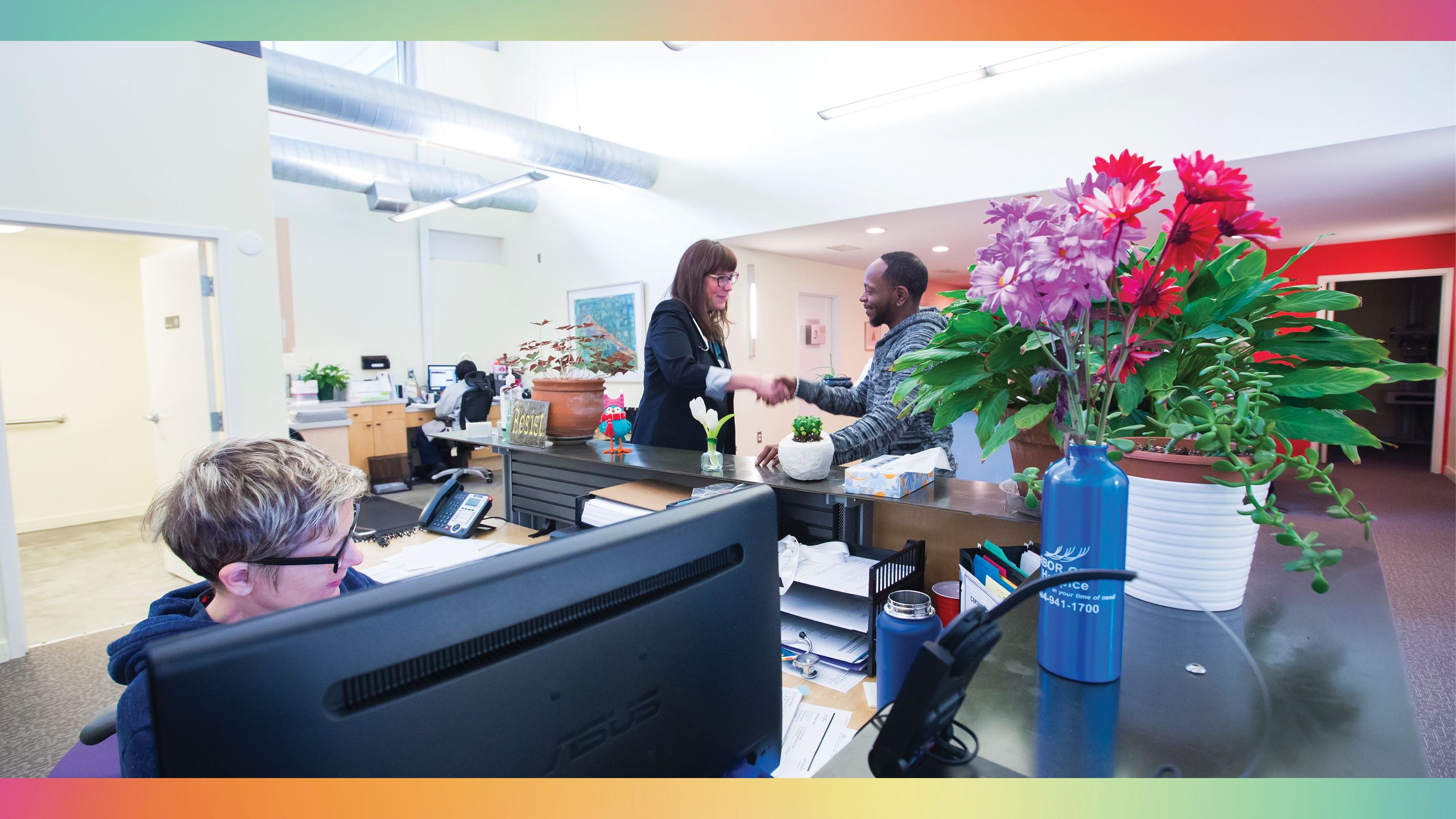 Michelle Sariev greets patient Sybastian Smith