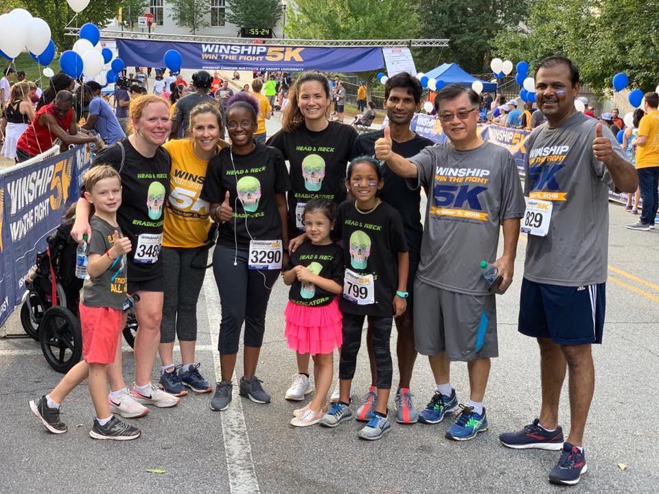 Winship race participants celebrate at the finish line