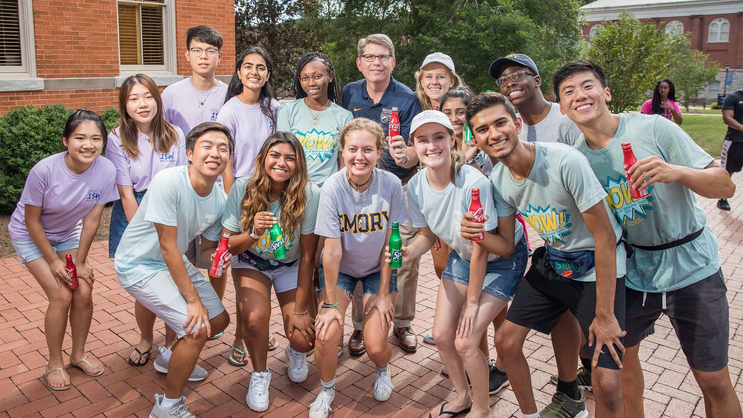 Oxford Dean Douglas A. Hicks joins students in the Coca-Cola toast.