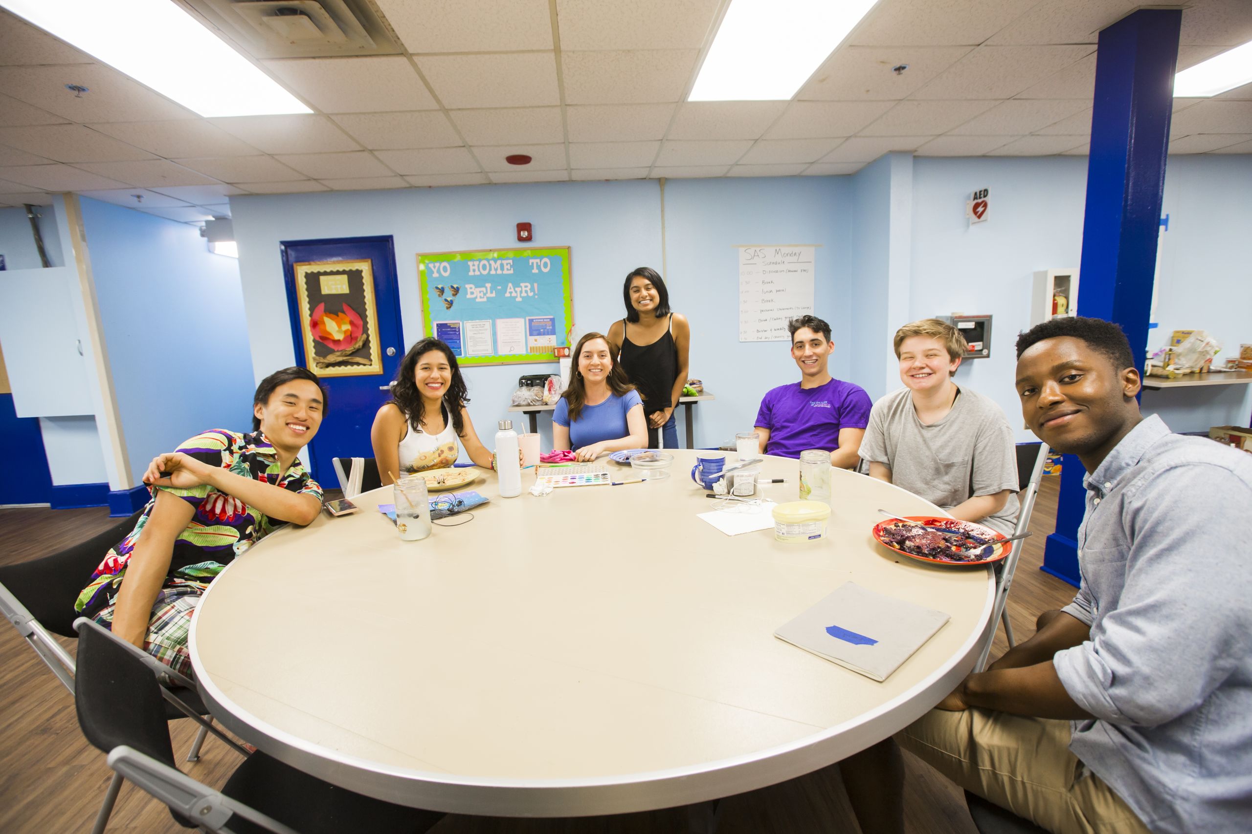 Emory Summer Scholars gather around the dinner table