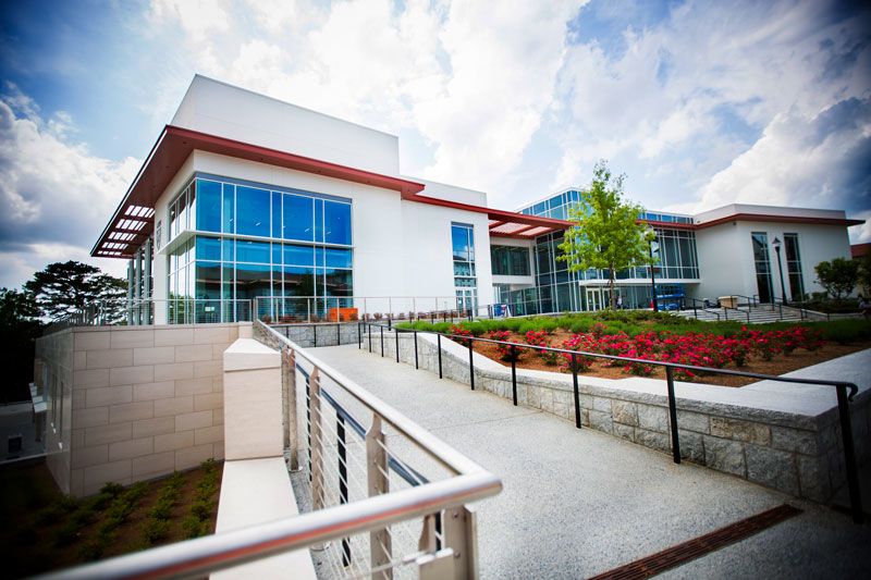 The exterior of the Emory Student Center against a blue sky