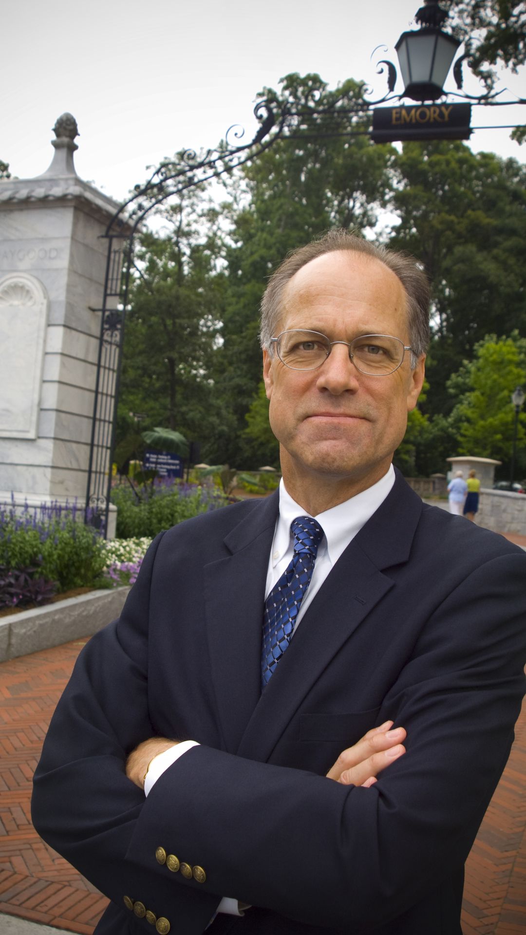 Gary Hauk in front of Emory's front gate