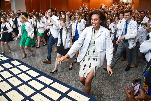 Emory School of Medicine students rush to learn where they will complete their medical residencies