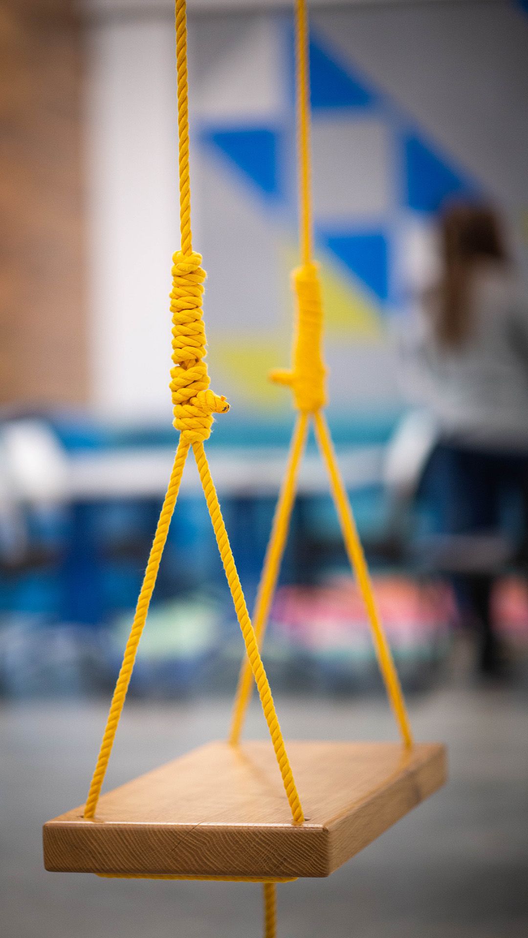 Shot of swings hanging from ceiling
