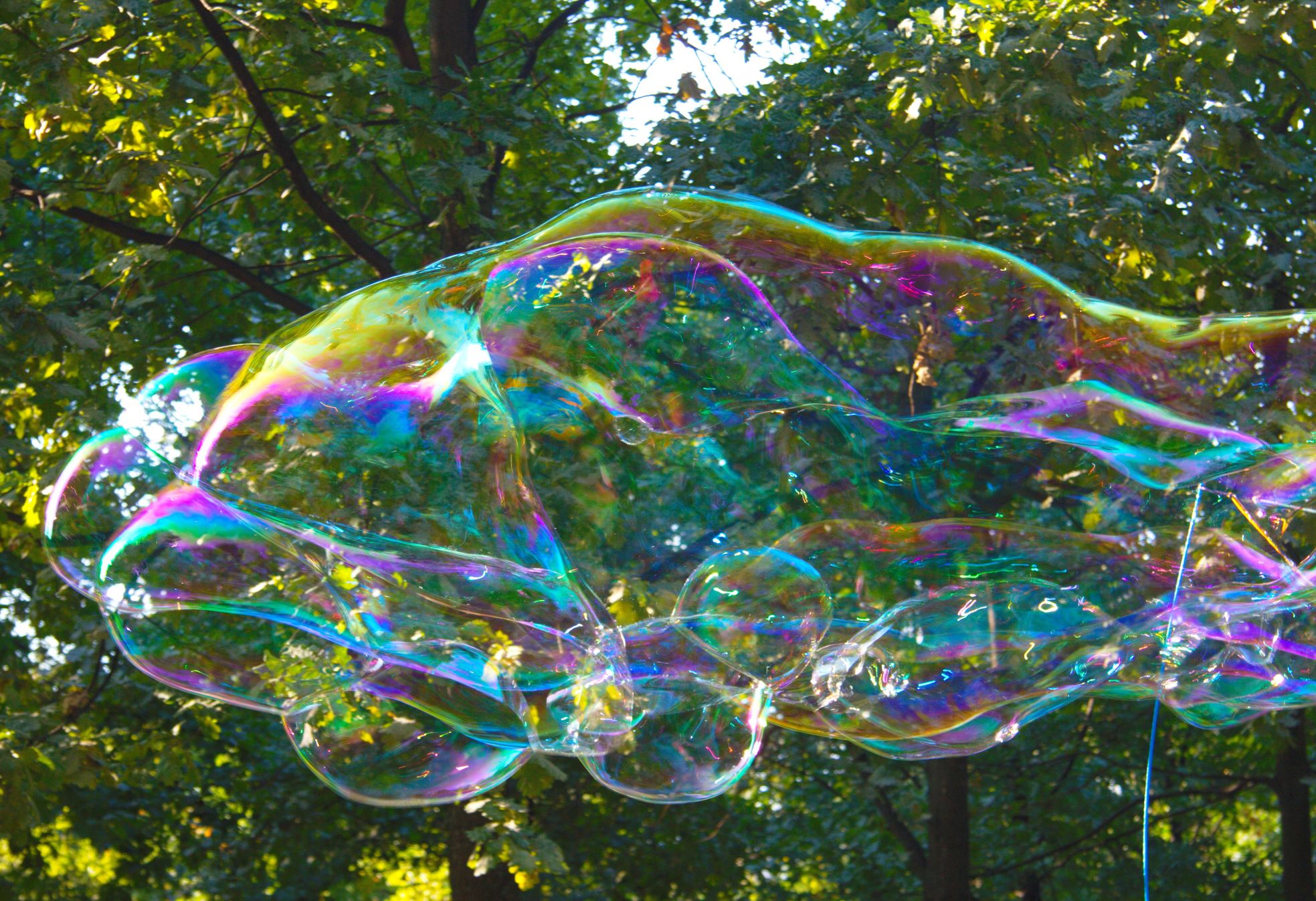 Physics of Giant Soap Bubbles