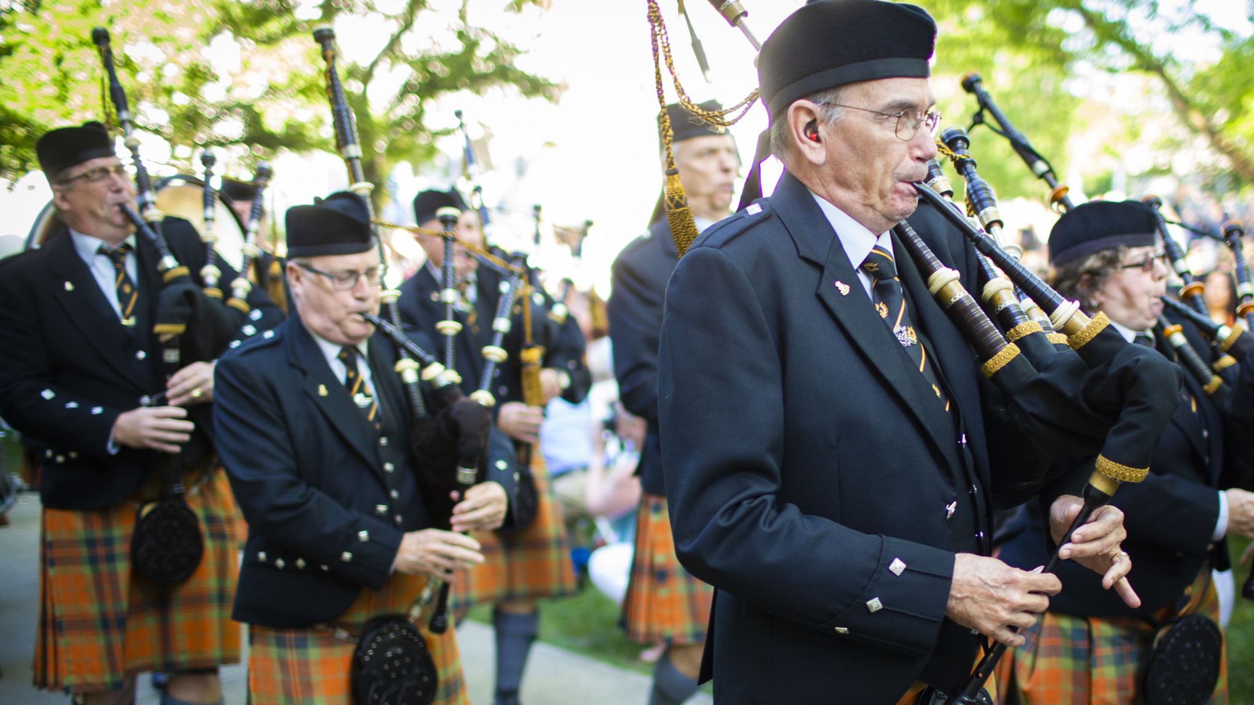 Bagpipers play on the Emory Quad in a past Commencement event