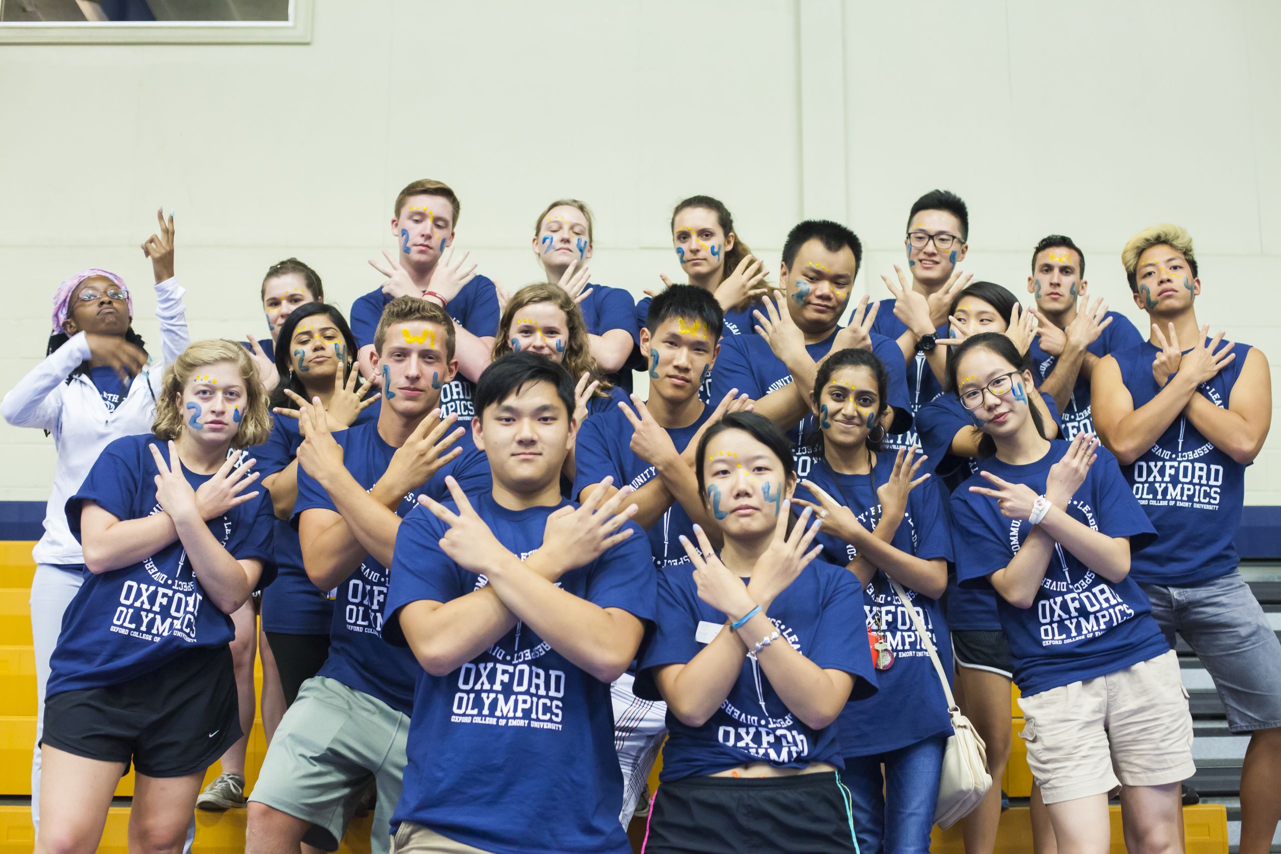 Students Posing in matching shirts during the Oxford Olympics