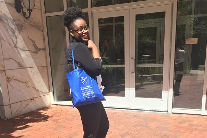 Alexis Perkins, Boisfeuillet Jones Medal awardee for the School of Nursing, outside the School of Nursing