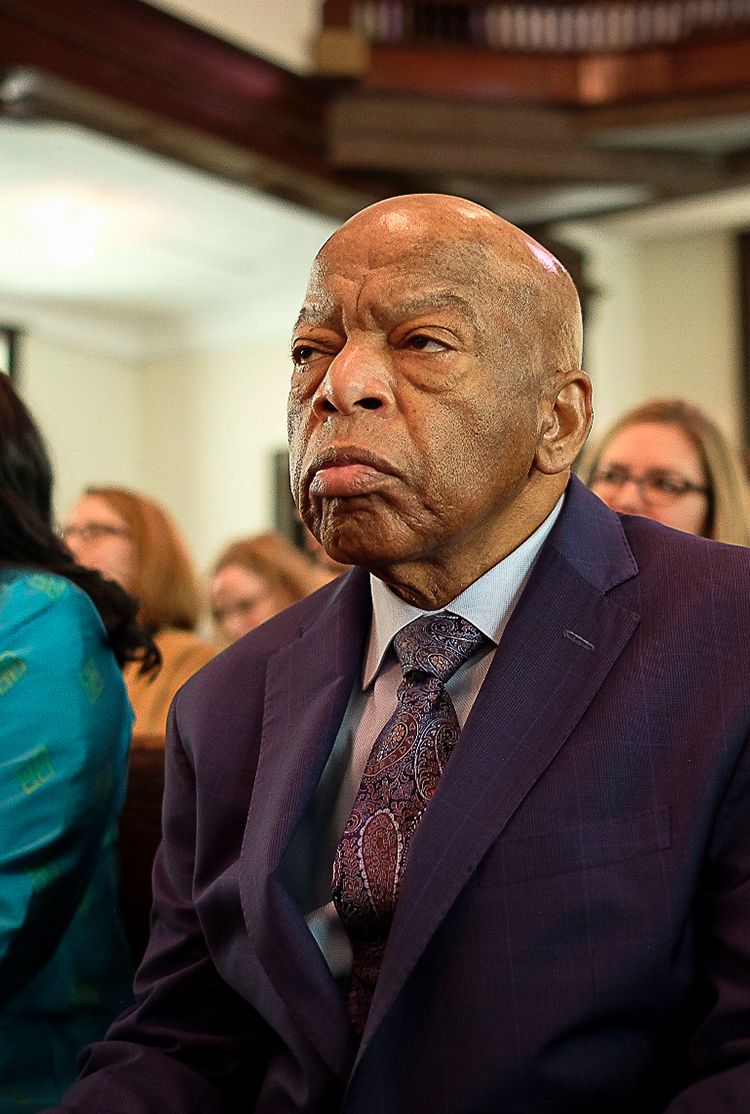 Senator John Lewis sitting in church pew