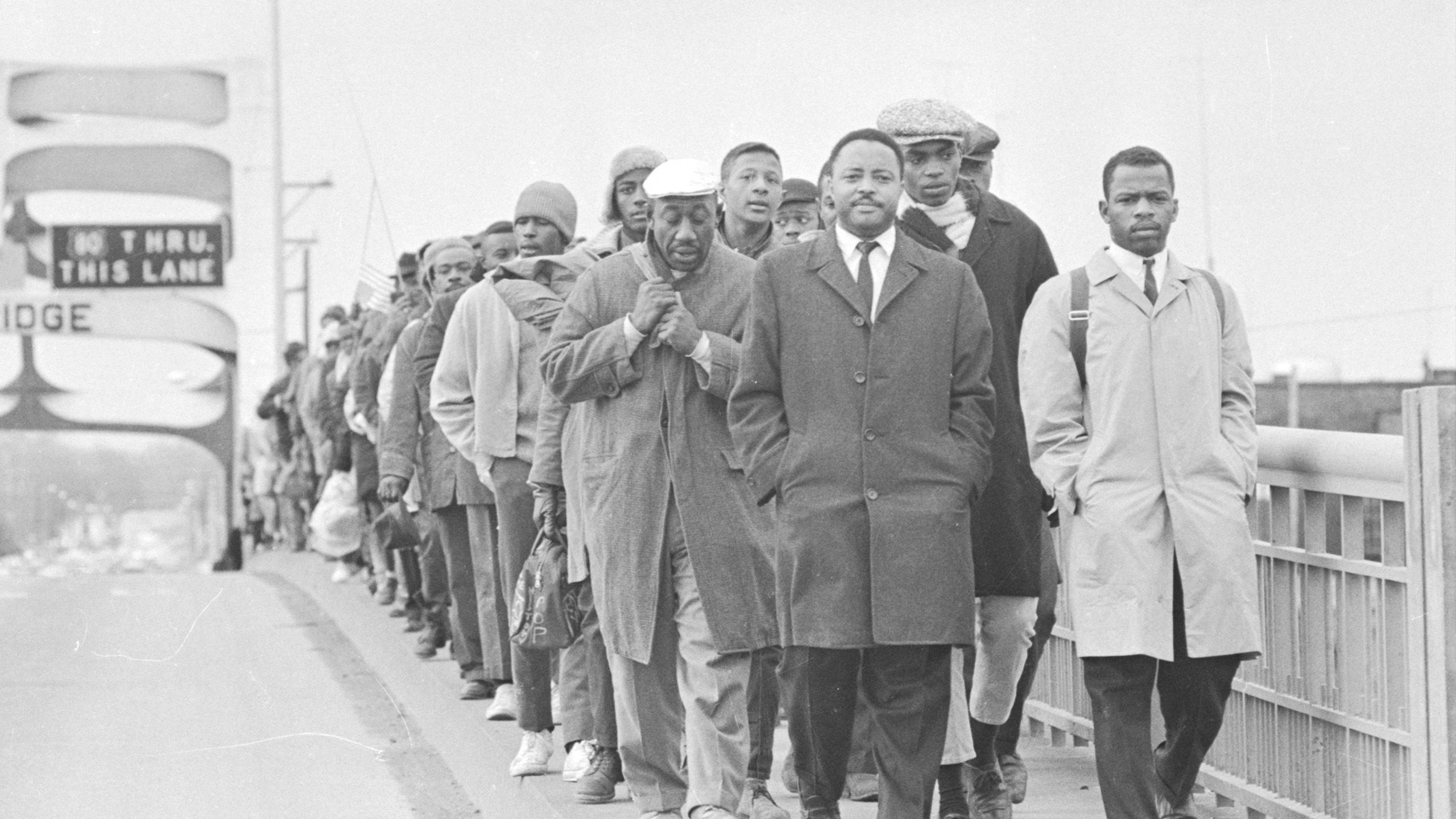 John Lewis with fellow protestors at Edmund Pettus Bridge.