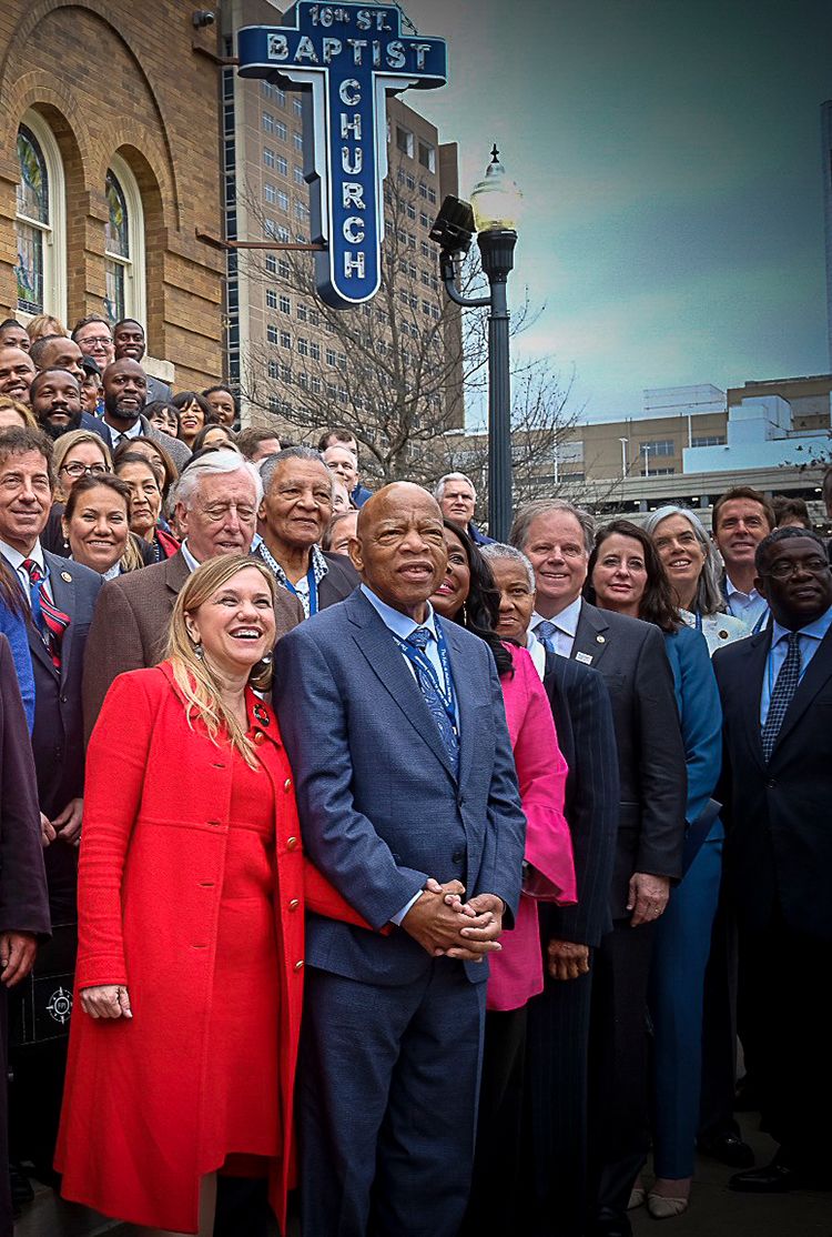 portrait of crowd with John Lewis on the steps of the 16th Street Baptist Church in Selma AL