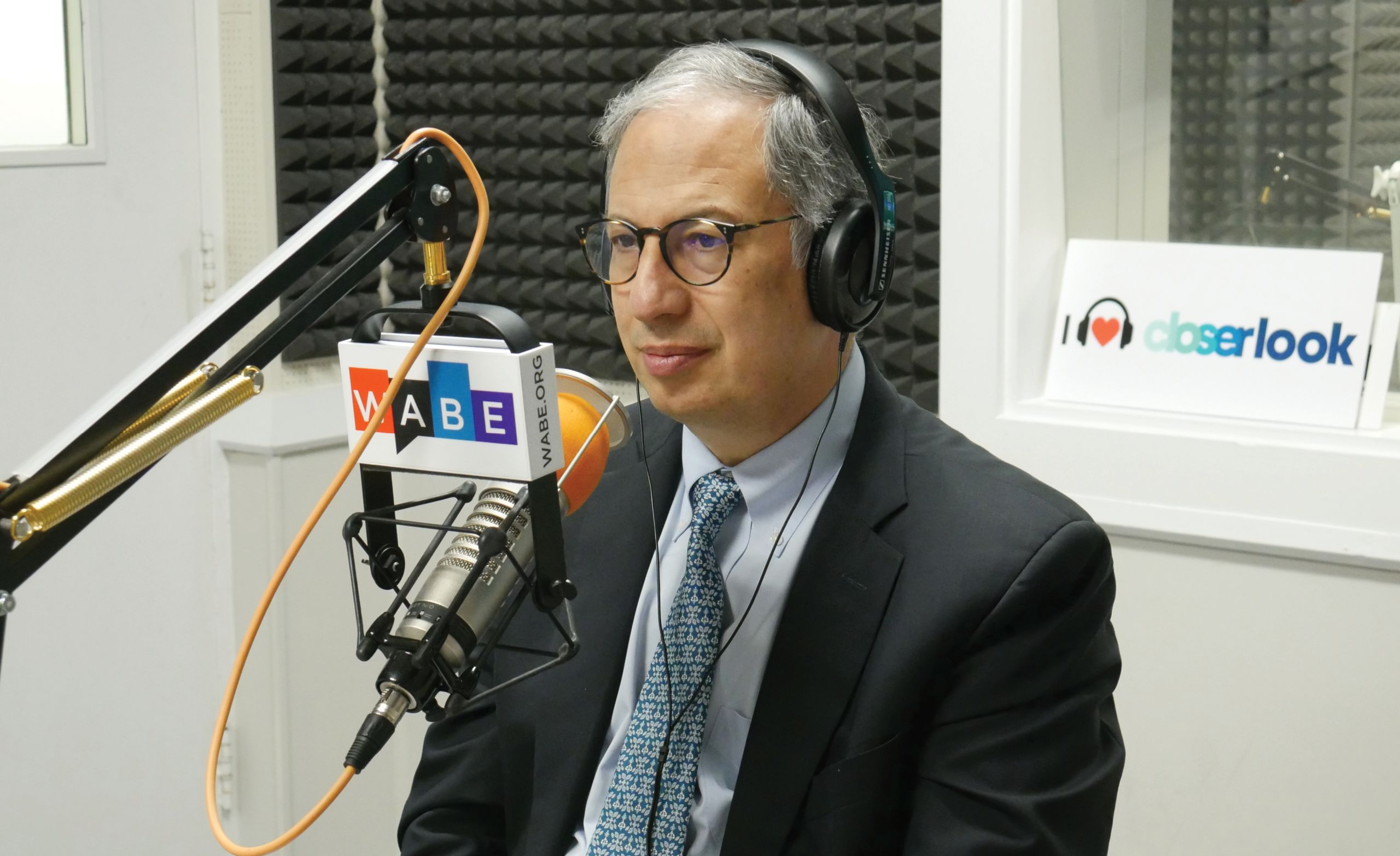 Carlos del Rio doing a radio interview at WABE's studio.