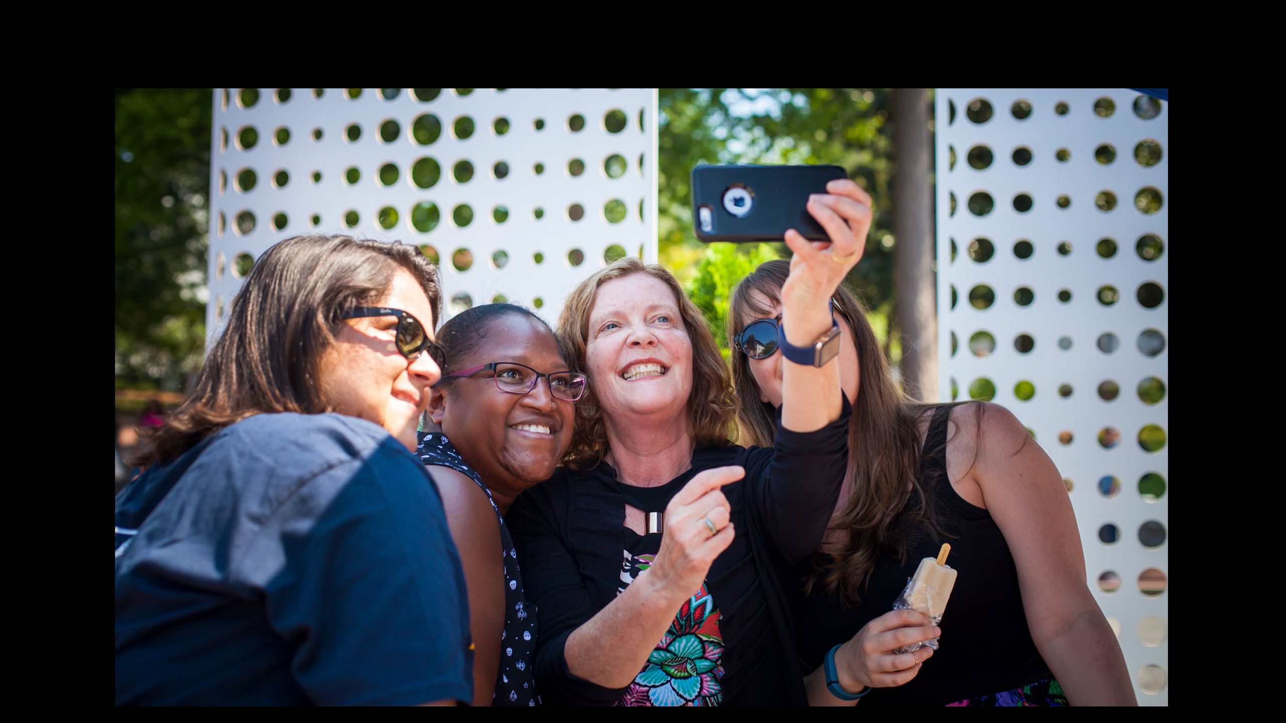 Sterk takes selfie with Emory alumni