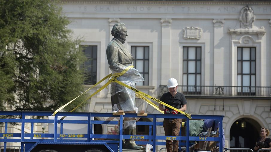 Workers transport Confederate leader Jefferson Davis to new location