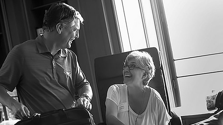 Carmel and Greg laughing together